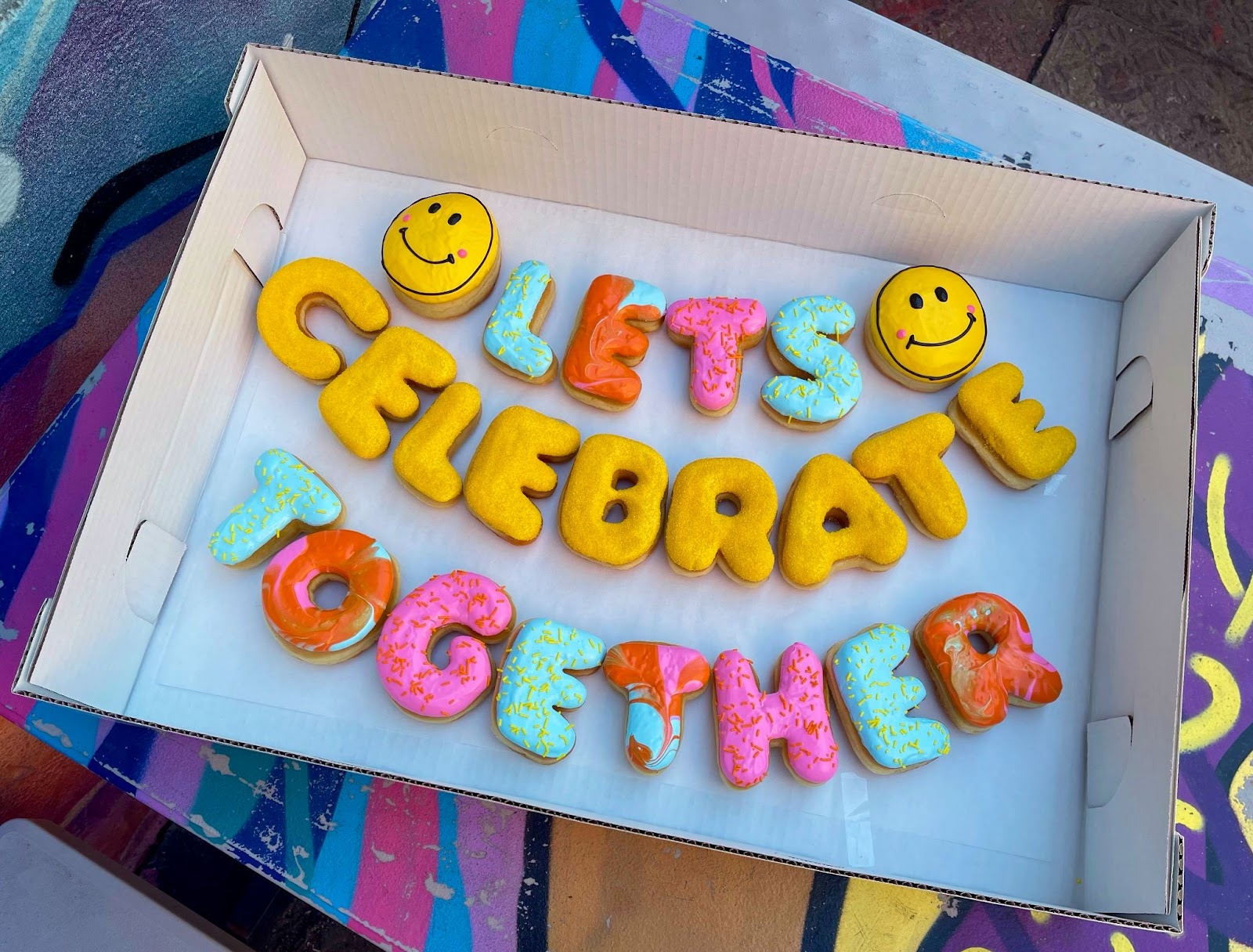 Photo of display from the Letterbox Doughnuts store opening event in 2021